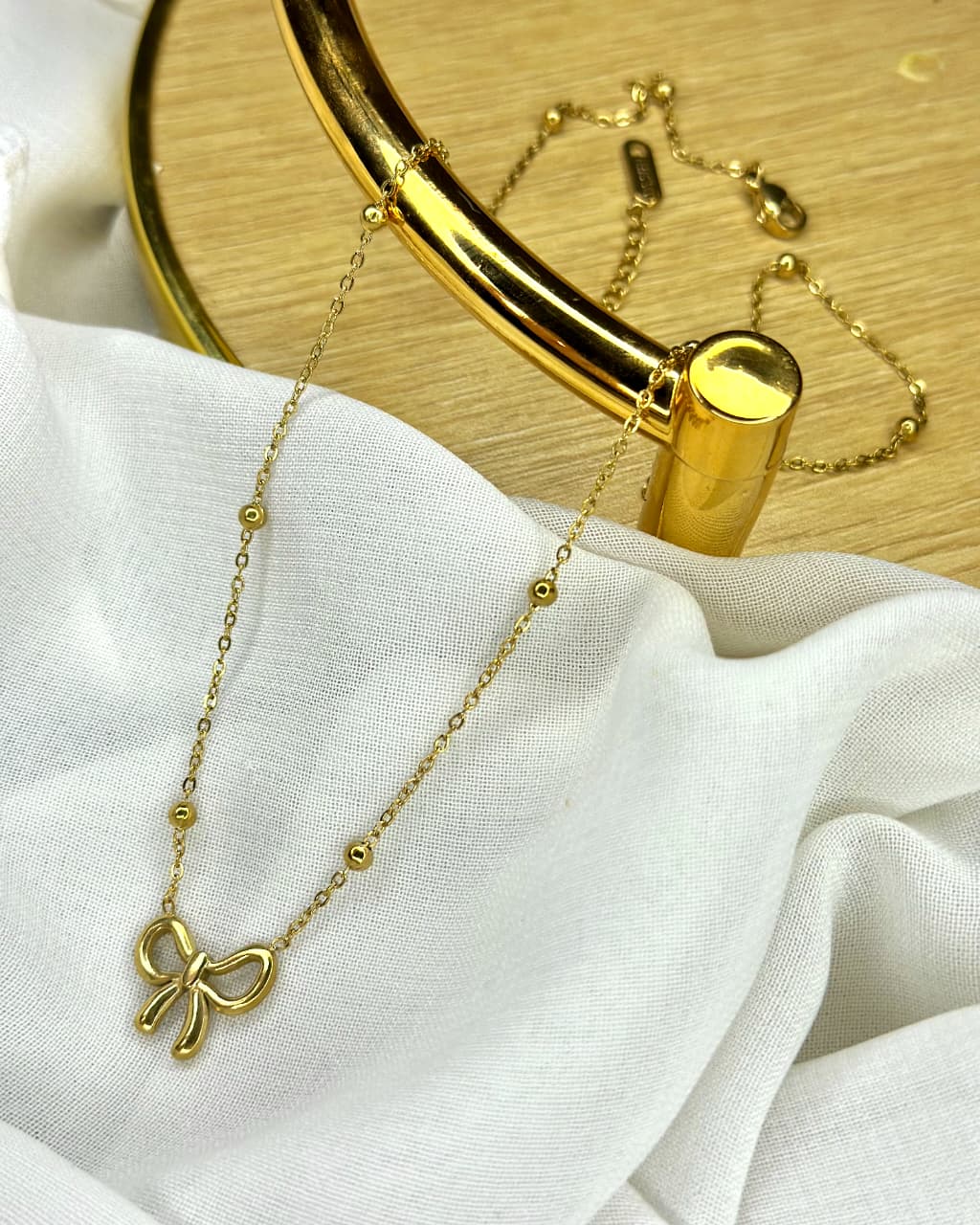 Elegant Stainless Steel Bow Pendant Necklace